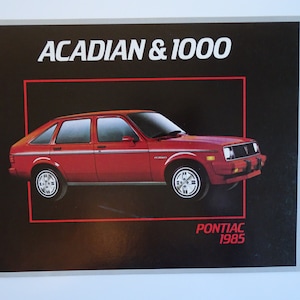 Original 1986 Pontiac Acadian & 1000 Dealer Sales Car Brochure