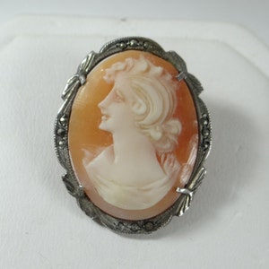 Antique Art Deco Coin Silver God or Goddess Hand Carved Victorian Shell Cameo Brooch with Marcasite Accents & Pendant Hardware ca.1920