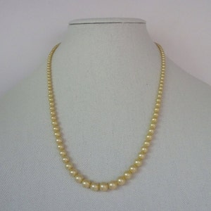 Mid Century Cream Faux Pearl Necklace with Silver Tone Filigree Clasp - A Lovely Vintage Faux Pearl Necklace - 22&quot;