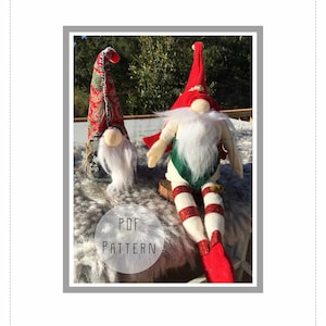May include: A PDF pattern for a forest gnome and elf. The gnome is wearing a red hat with white trim and a white beard. The elf is wearing a green and red striped outfit with a red hat. The pattern is available for download.