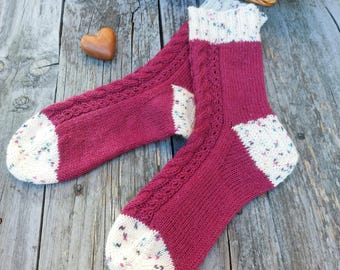 Hand knitted socks with cable pattern