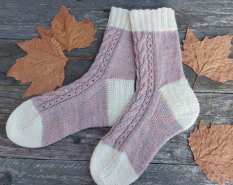 Hand knitted socks with cable pattern