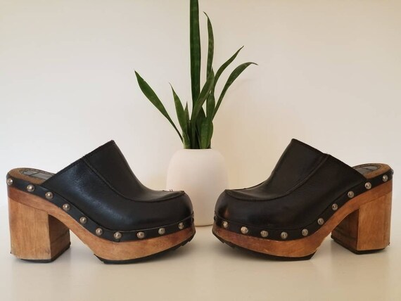 black leather clogs