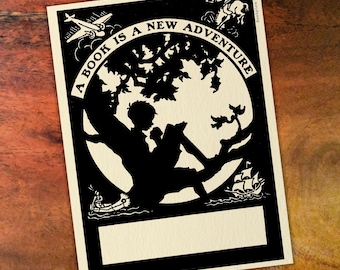 Boy Reading In Tree Bookplate - "A Book Is A New Adventure"