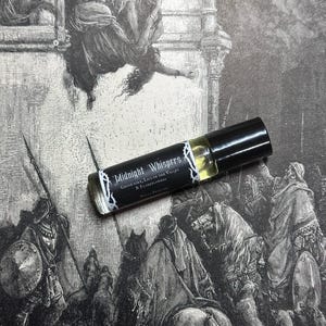 May include: A black and white image of a scene from a book. A small glass bottle with a black cap and a label that reads "Midnight Whispers Grave Dirt, Lily of the Valleys & Elderflowers" is in the foreground.