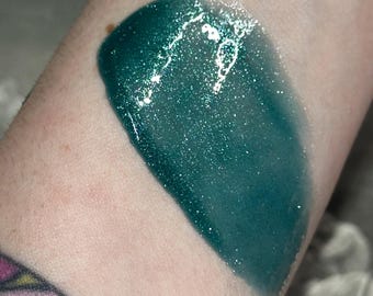 Cold Intentions -  Sheer Shimmer Teal Blue Lip Gloss