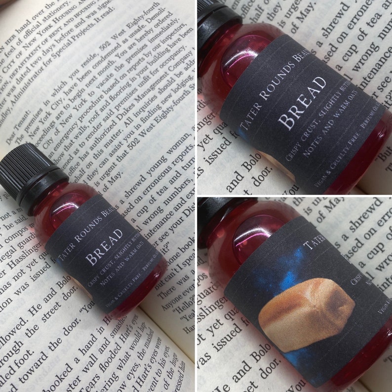 May include: Two small glass bottles with red liquid inside. The bottles are labeled "Tater Rounds Beauties" and feature a design of a loaf of bread with the text "Bread" and "Crispy Crust, Slightly Buttery, Notes and Warm Oad".