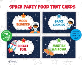 May include: Four printable food tent cards with a space theme. The cards feature a blue background with white stars and a white cloud with text. The text on the cards reads "Moon Burgers", "Rocket Fuel", "Space Cookies", and "Martian Mallows".