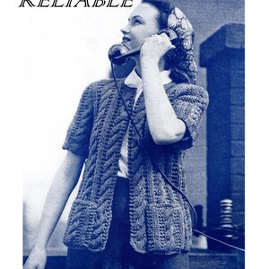 May include: A woman wearing a blue knitted cardigan with pockets and a white shirt, talking on a rotary phone. The cardigan has a cable knit pattern and short sleeves. The image is in black and white and has the word "RELIABLE" printed at the top.