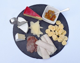 12in. Round Slate Cheese Board comes with one soapstone chalk