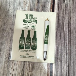 Midori 2016 Taiwán Taipei Eslite Limited Compañía de viajeros Cuaderno de viaje Fábrica de viajeros Cerveza de Taiwán Bolígrafo de punta de latón