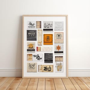 May include: A framed collage of 18 vintage matchbox labels with a Western theme. The labels feature cowboys, horses, saloons, and other Western imagery. The labels are arranged in a grid pattern and are printed in black, white, and red.