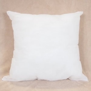 May include: A white pillow with a plain, smooth surface. The pillow is made of a soft, comfortable fabric.