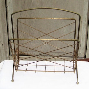 Brass metal MCM magazine rack, rustic distressed, rusty wire tube magazine stand, primitive, mid century 1950s, industrial farmhouse decor