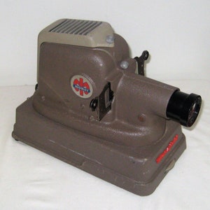 Antiker Diaprojektor aus galvanisiertem Metall, Midway Mansfield, elektrischer Stecker, Retro-Sammlerstück, 1930er Jahre, braun grau rot, Filmraumdekor