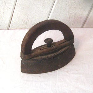Antique sad iron, rusty cast iron, wood handle, 1800s primitive laundry room decor repurposed door stop bookend
