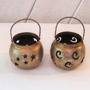 Pair of Vintage tin metal votive candle holder, gold tone cauldron shaped tea light holder, stars swirls, has handle, 1990s