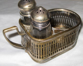 Vintage salt and pepper shaker in a silverplate caddy, antique salt pepper, small clear glass with silverplate lids, collectible S & P