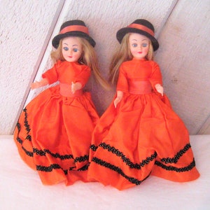 International doll, Souvenir of Switzerland doll, swiss, sleepy blinking eye doll, 8 inch, orange brown dress, mid century, 50s 60s
