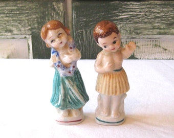 Antique ceramic hula girl boy figurine, kewpie dolls statues grass skirts leis,  Hawaiian Hawaii not perfect, mid century 40s 50s kitsch