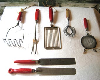 Antique MCM kitchen utensils red wood handles, grater fork wire brush masher colander knife spatula, SELLING SEPERATELY mid century 1950s