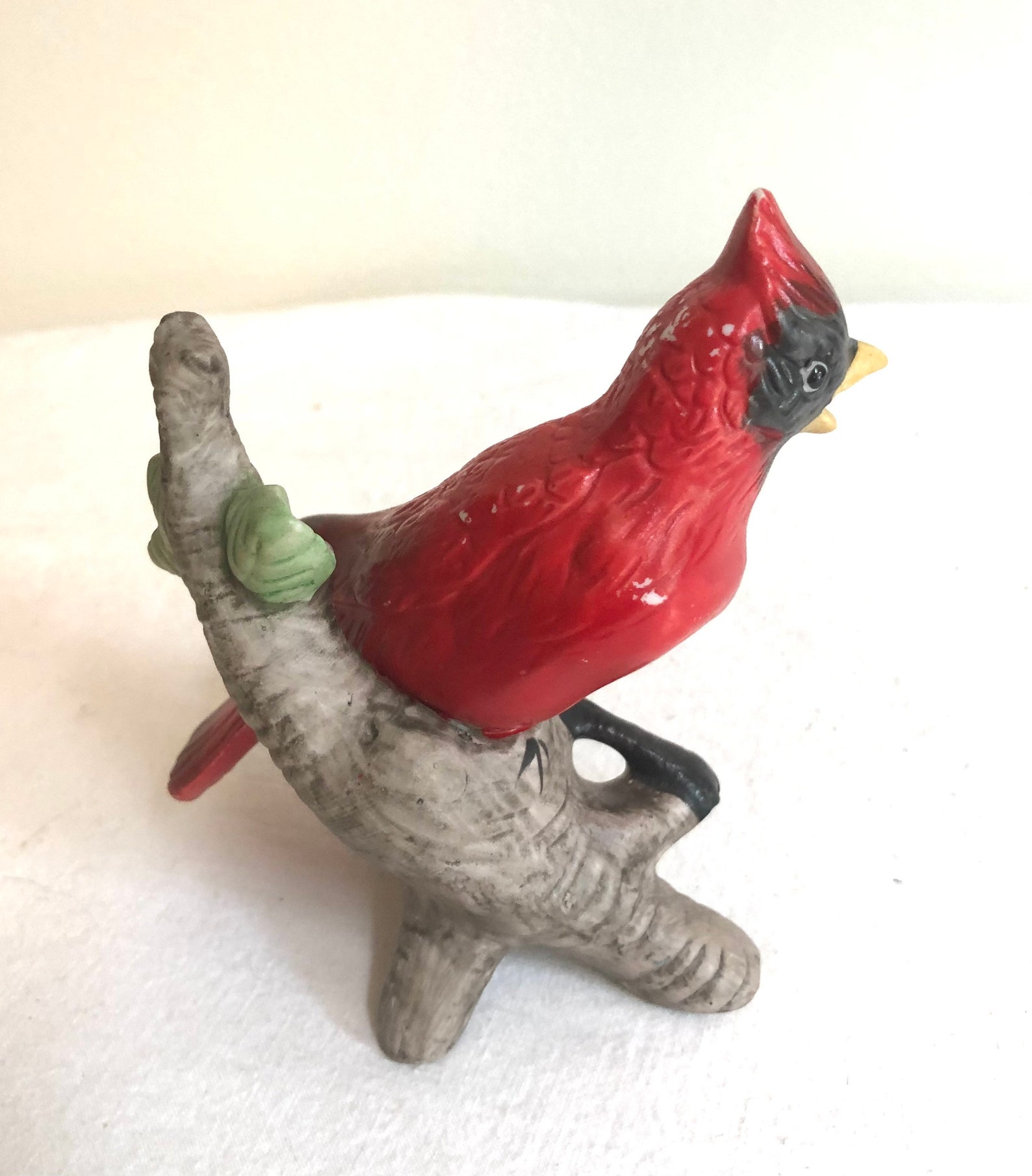 red cardinal garden statue