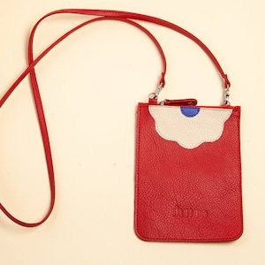 Arla Phone Crossby  with flower design. Available in leathers soft pink, red, blue and green. Handmade in Argentina