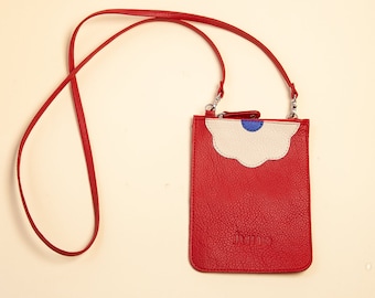 Arla Phone Crossby  with flower design. Available in leathers soft pink, red, blue and green. Handmade in Argentina