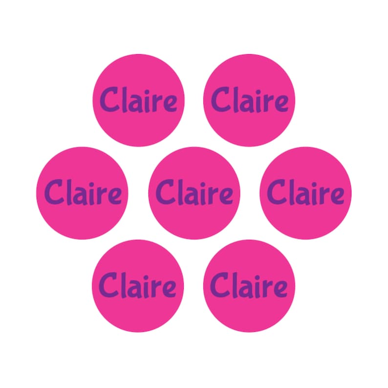 May include: Seven pink circles with the name "Claire" written in purple on each circle.