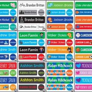 May include: A set of 36 colorful personalized name labels with various designs. Each label features a different name and a unique illustration, such as a pig, a rooster, a shark, a train, a heart, and a basketball. The labels are perfect for labeling school supplies, lunchboxes, and other belongings.
