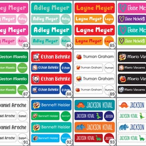 May include: A collection of rectangular and circular adhesive name labels featuring various names, colors, and graphic icons including sports balls, hearts, and dinosaurs. Each label set is numbered from 83 to 94, displaying personalized text.