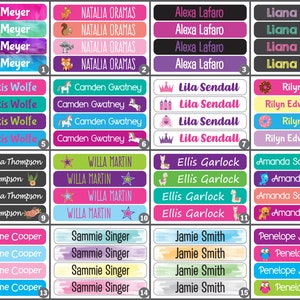 May include: A set of 16 colorful name labels with various designs. Each label has four lines of text with a different design on each line. The designs include animals, stars, crowns, and other fun graphics.