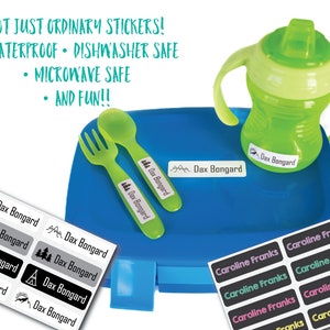 May include: A blue lunchbox with a green sippy cup, green fork and spoon, and several sheets of personalized stickers. The stickers feature names and various nature-themed graphics. Text on the image reads: "NOT JUST ORDINARY STICKERS! WATERPROOF - DISHWASHER SAFE - MICROWAVE SAFE - AND FUN!!"