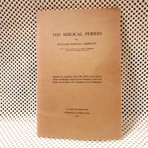 May include: A tan-colored book cover with the title "The Biblical Period" by William Foxwell Albright. The book was reprinted by permission from "The Jews: Their History, Culture and Religion" edited by Louis Finkelstein. The book was published in 1955.