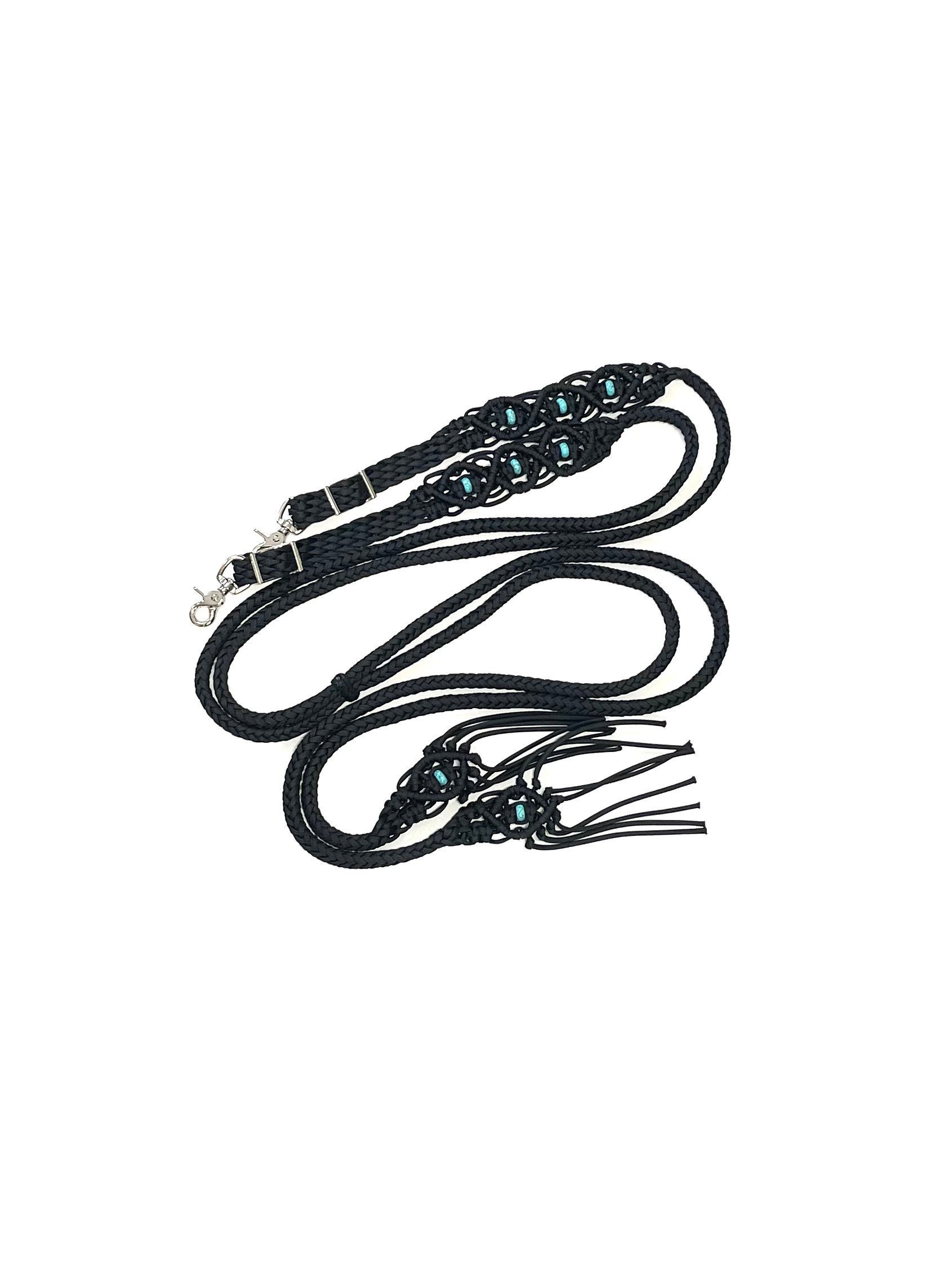 Split reins, these reins are handcrafted from paracord in black with Turquoise howlite beads