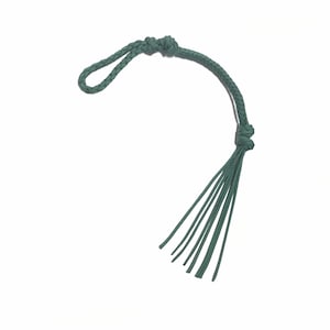 Hunter green riding crop hand braided from paracord