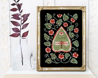 May include: A framed rectangular print featuring a black background with a central green planchette illustration. The planchette displays a red dragonfly, an eye, and the text GOODBYE, YES, and NO. It is surrounded by red flowers and green vines.