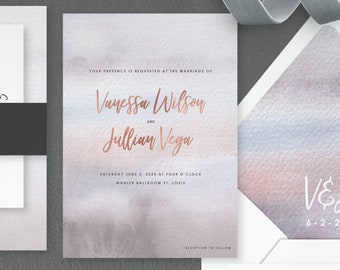 May include: Wedding invitation suite with a watercolor background in shades of purple and pink. The invitation features the couple's names, "Vanessa Wilson and Jullian Vega", and the date "6-2-20". The RSVP card includes a response section and the details card includes the wedding website.