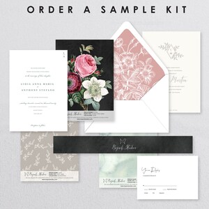 May include: A sample kit for wedding invitations featuring a black and white floral design with a pink envelope liner. The kit includes a sample invitation, RSVP card, and envelope. The text on the invitation reads "Lidia Anna Maria & Anthony Stefano".