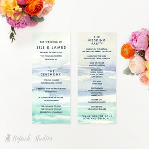 May include: Wedding ceremony programme with a watercolour background in shades of blue and green. The programme lists the order of events for the ceremony and the wedding party. The text is in a dark blue font.