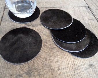6 Untersetzer aus Kuhfell schwarz 10cm rund
