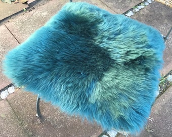 seat cover / pad made out of natural lambskin / sheepskin colour "petrol" 42cm x 42cm