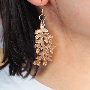Acrylic botanical gold glitter earring