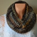 see more listings in the Knitted scarves section