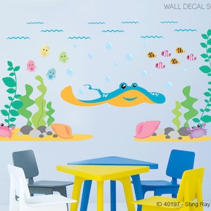 May include: A colorful stingray wall decal with seaweed, seashells, and crabs. The decal is perfect for a child's room or playroom. ID 40197 - Sting Ray