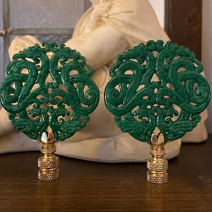 A Pair Of Chinoiserie Kelly green Lamp Finials