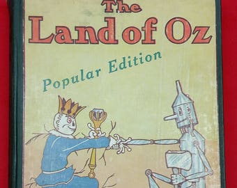 Odwiedź Oz Przeczytaj popularną edycję „Krainy Oz” autorstwa L Franka Bauma z 1904 r. Czarnoksiężnik z Krainy Oz – przedmiot kolekcjonerski