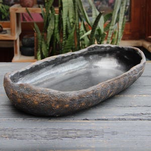 Vaso Ikebana ovale in ceramica nera rustica: vaso per orchidee e piante acquatiche senza fori di drenaggio.