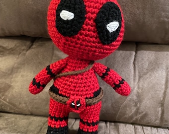 red and black dead pool plushie