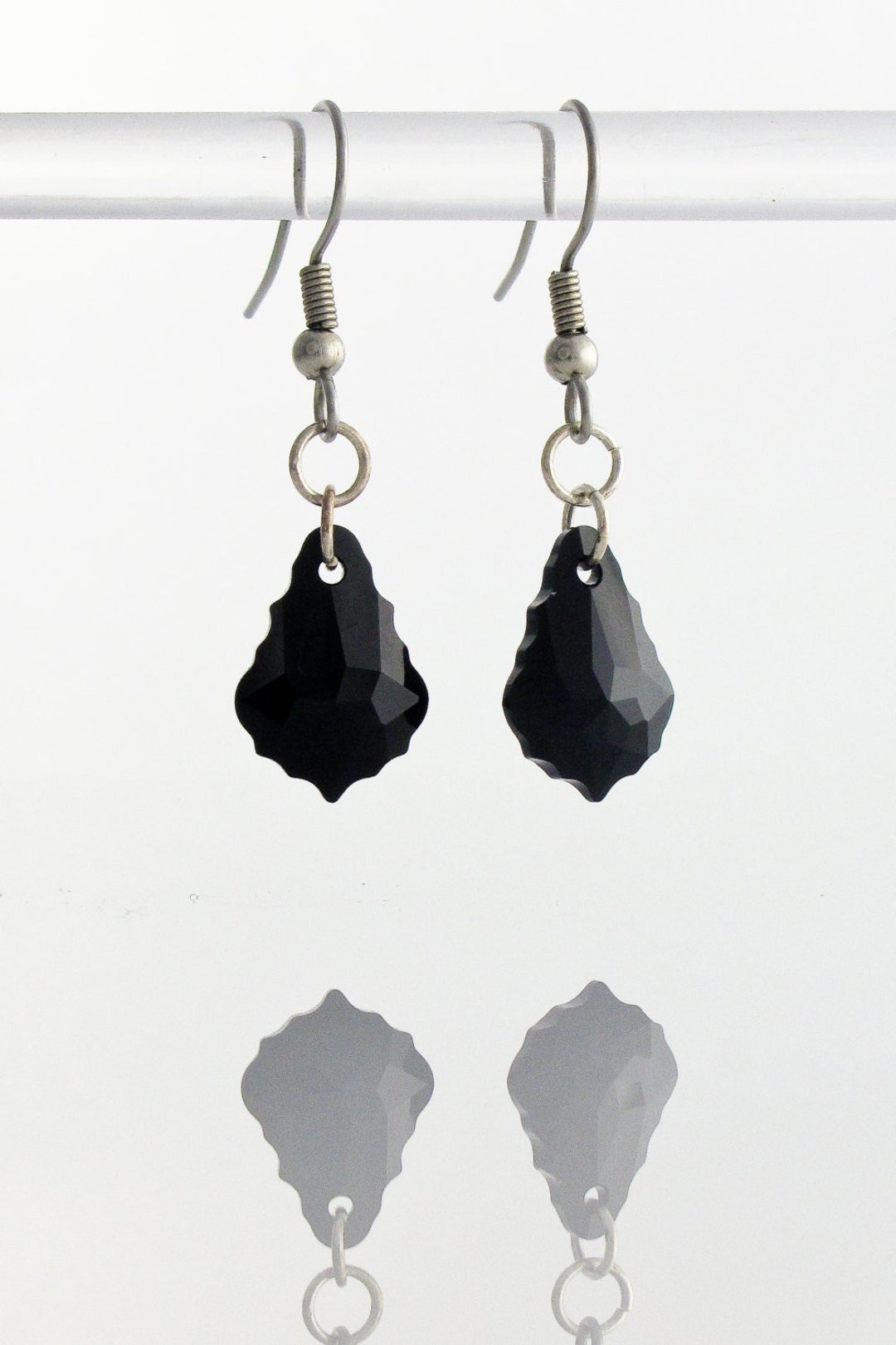 Black swarovski earrings deals